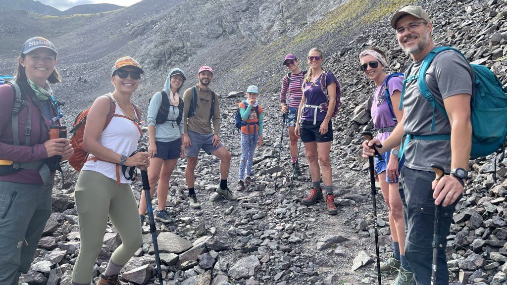 Leadership retreat participants hiking above Hayden Backcountry Lodge in the San Juan Mountains