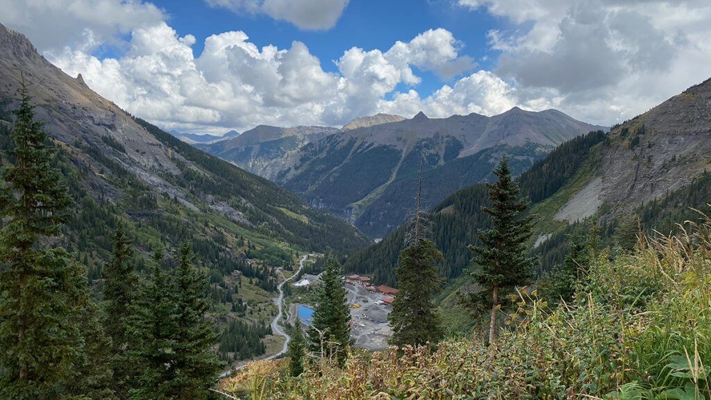 Guests arriving at Hayden Backcountry Lodge after hiking the final approach through the San Juan Mountains.